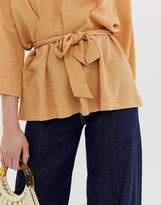 Thumbnail for your product : ASOS Tall DESIGN Tall textured oversized top with v neck and tie waist