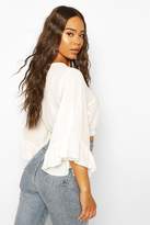 Thumbnail for your product : boohoo Woven Frill Sleeve Wrap Front Crop Top