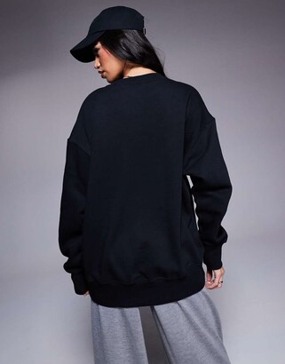 nike oversized mini swoosh sweatshirt