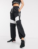 Thumbnail for your product : Reebok Training woven joggers in black with side logo