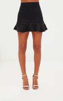 Thumbnail for your product : PrettyLittleThing Petite Black Flippy Hem Skirt