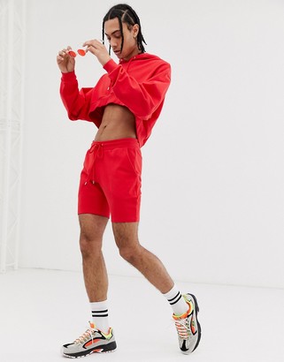ASOS Design DESIGN crop oversized tracksuit with hood and shorts in red