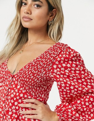 ASOS Petite DESIGN Petite v neck button through mini dress with shirring in red floral print