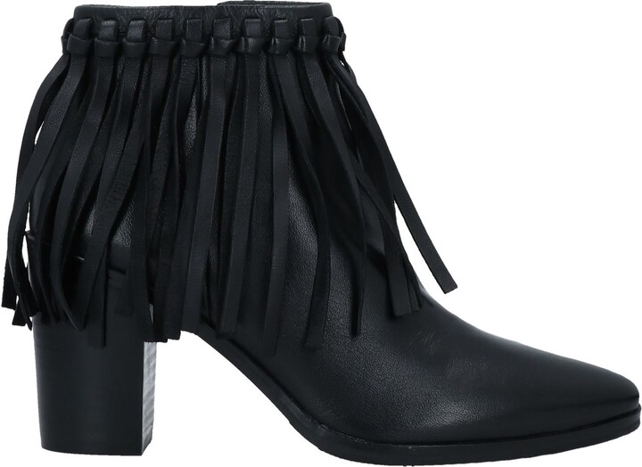 black suede booties with fringe