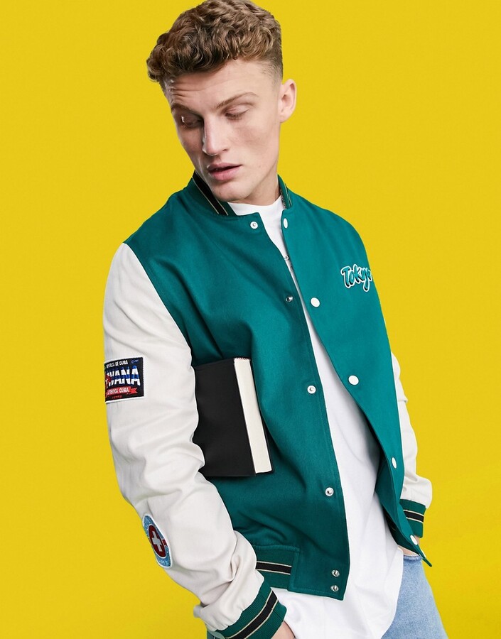 ASOS DESIGN oversized varsity cotton bomber jacket in green with embroidery  badging - ShopStyle