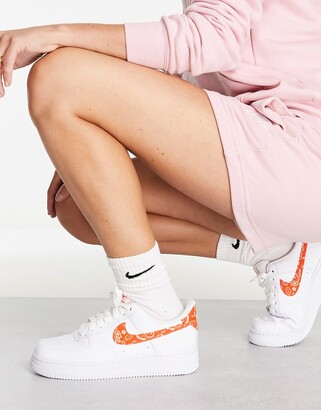 Nike Air Force 1 '07 ESS sneakers in white and orange - ShopStyle