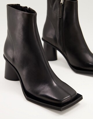 ASOS DESIGN heeled chelsea boots with extreme square toe and round heel in black leather