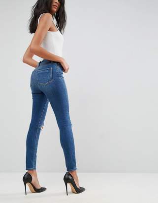 ASOS Design Ridley High Waist Skinny Jeans In Corinne Dark Wash With Rips And Busts