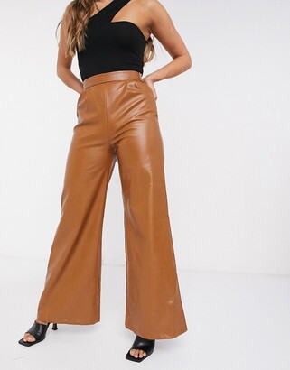 tan patent leather pants