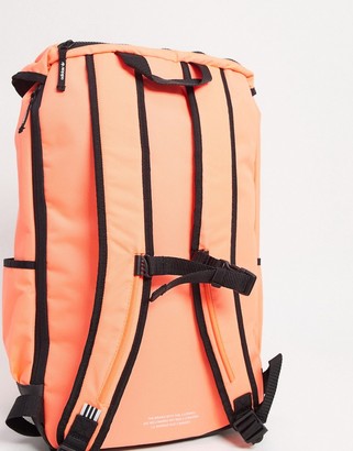 adidas Premium Essentials Top Loader backpack in signal coral