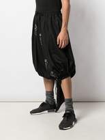 Thumbnail for your product : Bernhard Willhelm asymmetric drop-crotch trousers
