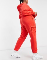 Thumbnail for your product : Nike Swoosh Plus fleece trackies in red