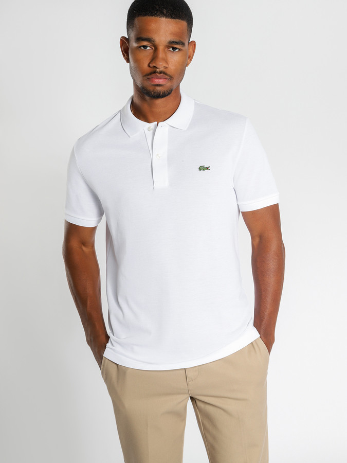 white polo shirt and khaki pants