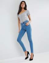 Thumbnail for your product : ASOS Design DESIGN Ridley high waisted skinny jeans in light wash