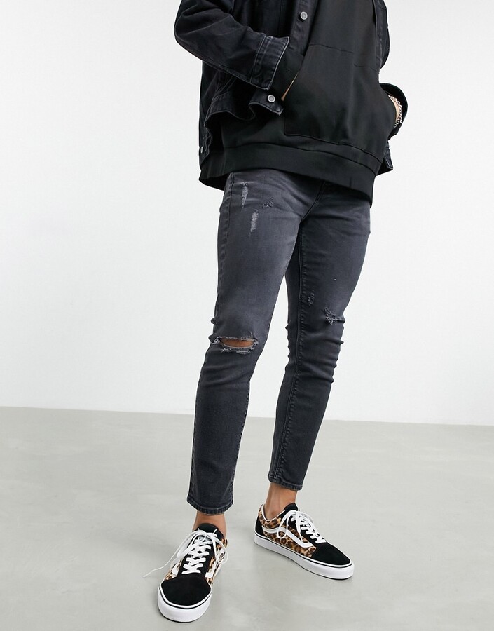 ASOS DESIGN cropped skinny jeans in black wash with rips - ShopStyle