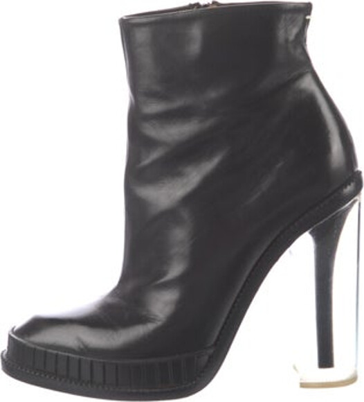 Maison Margiela Leather Ankle Boots Black Square-Toes Platform Concealed Zip Closure at Sides Unfortunately, due to restrictions, this item may not be eligible for shipping in all areas.