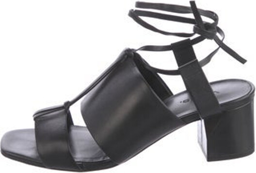 Vince Leather Sandals Black Platform Wrap-Around Straps & Tie Closures Includes Box & Dust Bag Unfortunately, due to restrictions, this item may not be eligible for shipping in all areas.