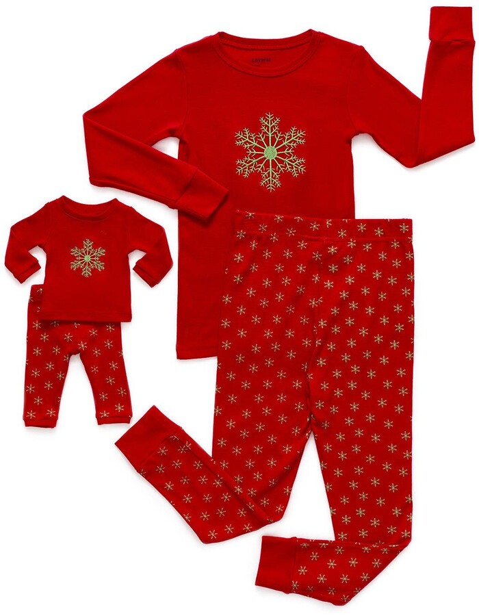 girl and doll matching christmas pajamas