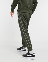 nike logo taping cuffed joggers