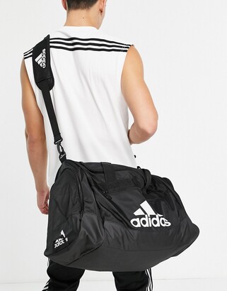 adidas Training Defender IV medium duffle bag in black - ShopStyle