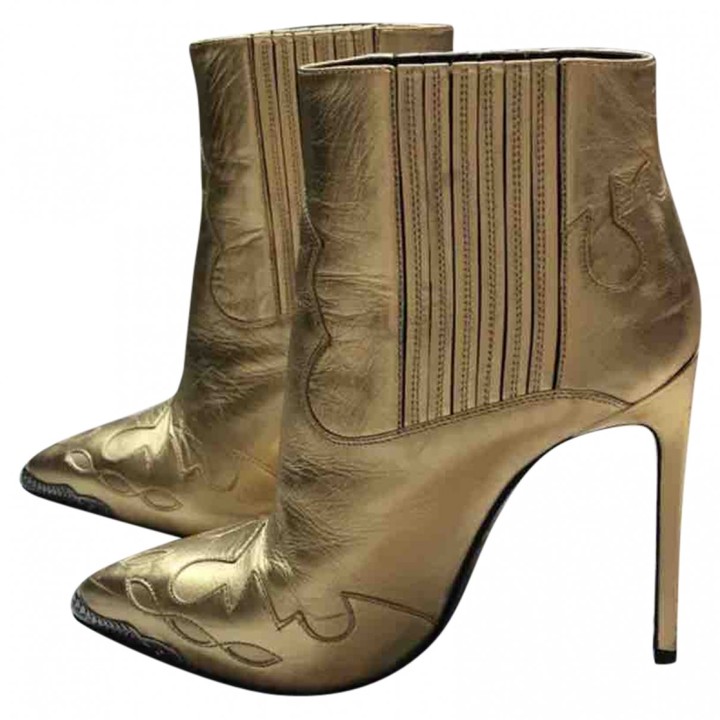 saint laurent gold boots