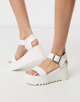 white chunky flatforms
