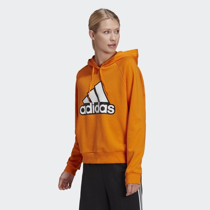 orange adidas sweatshirt