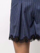 Thumbnail for your product : Koché High-Waisted Pinstripe Shorts
