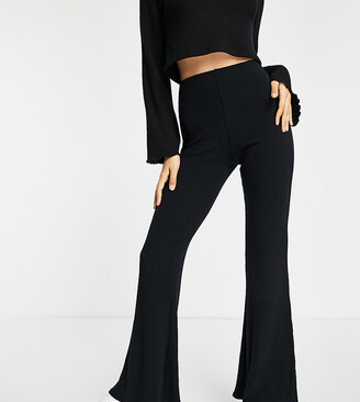 New Look Petite ribbed flared leggings in black - ShopStyle