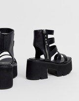 Thumbnail for your product : Lamoda black chunky cleated sandals