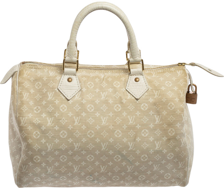 louis vuitton cream handbolsa