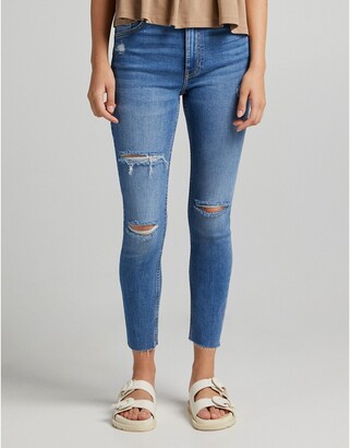 Bershka high waist skinny jeans with rip detail in medium stone - ShopStyle