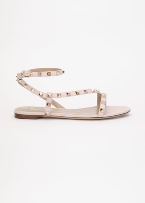 Valentino Garavani Rockstud Flat Asymmetric Ankle-Strap Sandal - ShopStyle