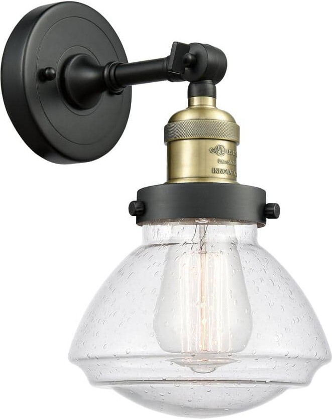 Innovations Olean 1-Light Black Antique Brass, Seedy Wall Sconce with Clear Glass Shade