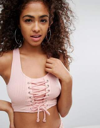 Ellesse Cropped Bralet With Lace Up Front In Rib