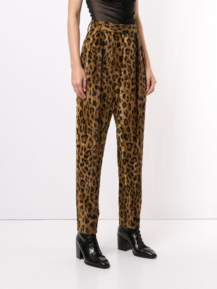 KHAITE The Magdeline cheetah print trousers