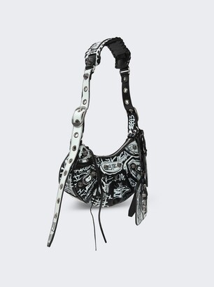 Le Cagole XS Graffiti Leather Shoulder Bag in Black - Balenciaga