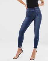 Thumbnail for your product : Spanx shape and lift distressed skinny jeans