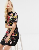 Thumbnail for your product : ASOS DESIGN embroidered mini dress with high neck and open back