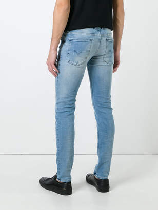 Diesel shredded trim jeans