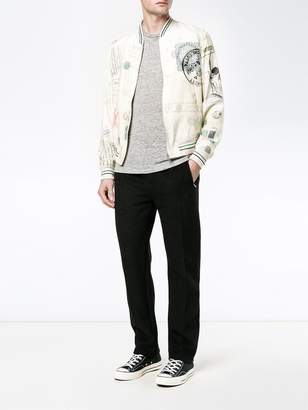 Alexander McQueen letters from India bomber jacket