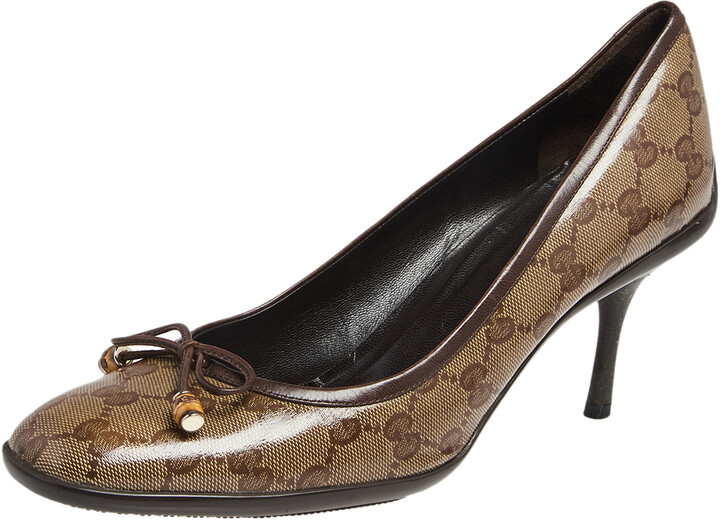 gold round toe pumps