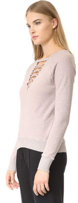 Pam & Gela Lace Up Sweatshirt