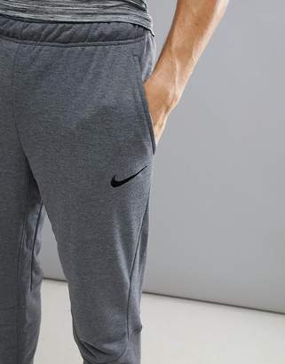 Nike Training fleece tapered joggers in dark grey 860371-071