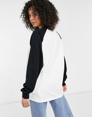 ASOS Tall ASOS DESIGN Tall oversized long sleeve t-shirt with contrast raglan seam in white and black