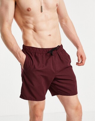 ASOS DESIGN swim shorts in burgundy mid length - ShopStyle