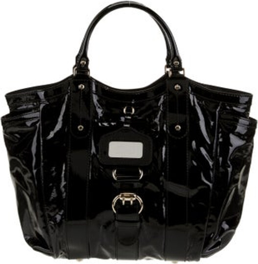 Gucci Hobo Black Patent Leather Princy Accent Gold-Tone Hardware Rolled Handles Bow Accents Logo Jacquard Lining & Single Interior Pocket Snap Closure at Top Protective Feet at Base Includes Dust Bag & Compact Mirror