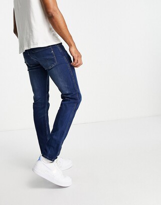 Replay Anbass slim fit jeans in mid blue - ShopStyle