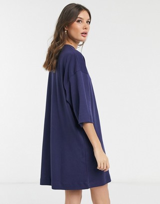 Asos Tall ASOS DESIGN Tall oversized winter weight T-Shirt Dress with pocket in navy
