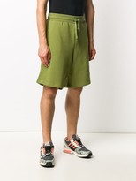 Thumbnail for your product : Moschino Milano logo-print track shorts